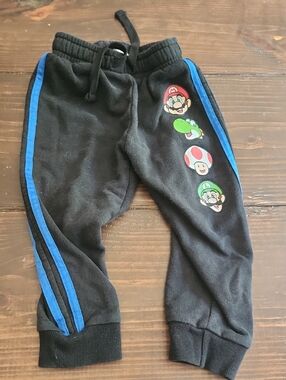 Nintendo Black Joggers with Blue Side Stripes and Mario Graphics
